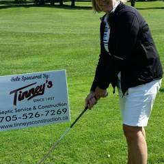 Golf hole sponsored by Tinney's Septic Service & Construction