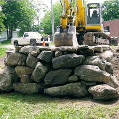 Excavator constructing raised driveway 2