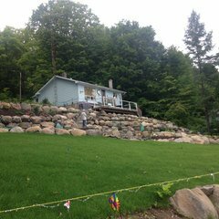 residential landscaping with boulders
