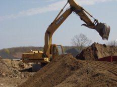 excavator digging dirt