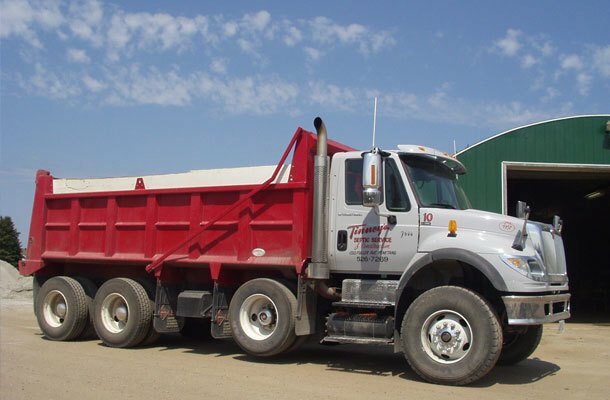 red and white dump truck
